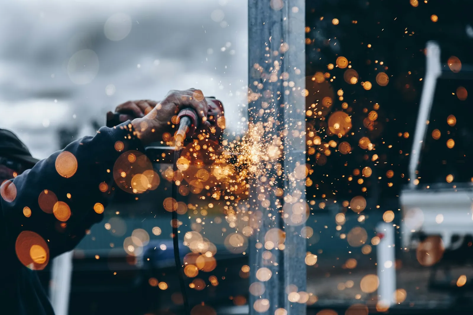 Sparks from metal finishing in a workshop